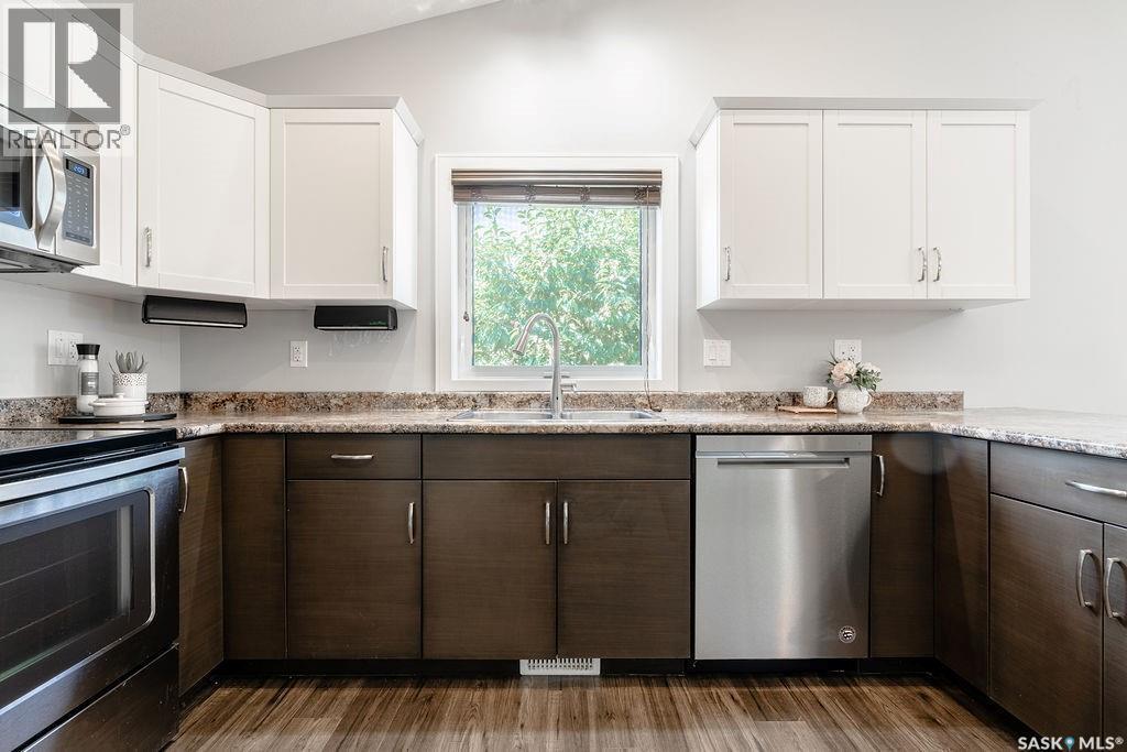 113 Beaudry Crescent, Martensville, SK - Indoor Photo Showing Kitchen With Stainless Steel Kitchen With Double Sink