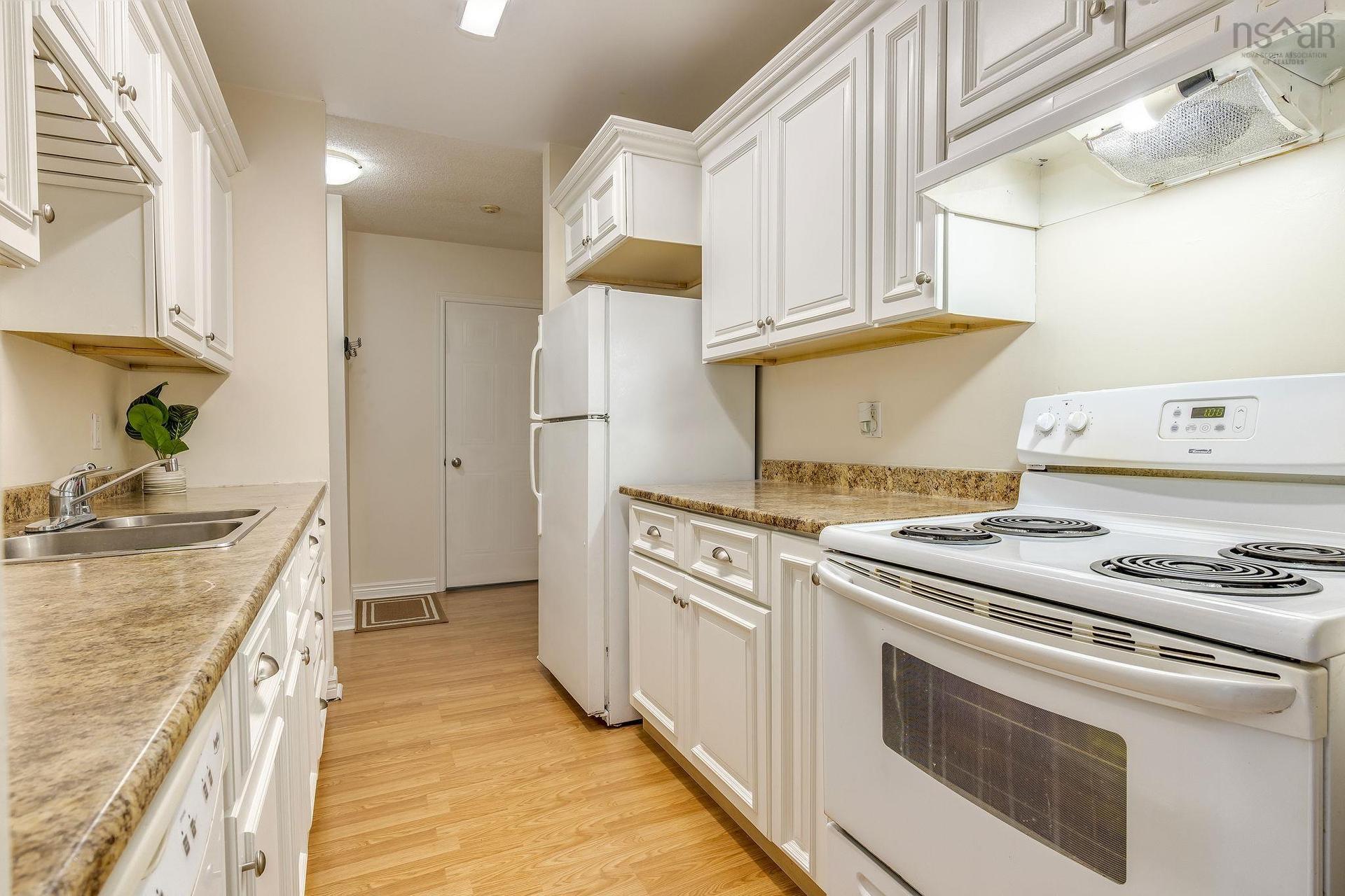#417 15 Langbrae Drive, Clayton Park, NS - Indoor Photo Showing Kitchen With Double Sink