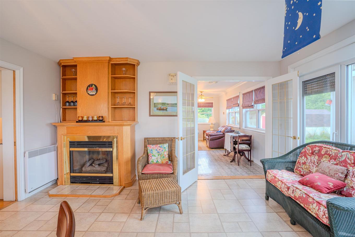 78 Lady Slipper Lane, Murray River, PE - Indoor Photo Showing Living Room With Fireplace