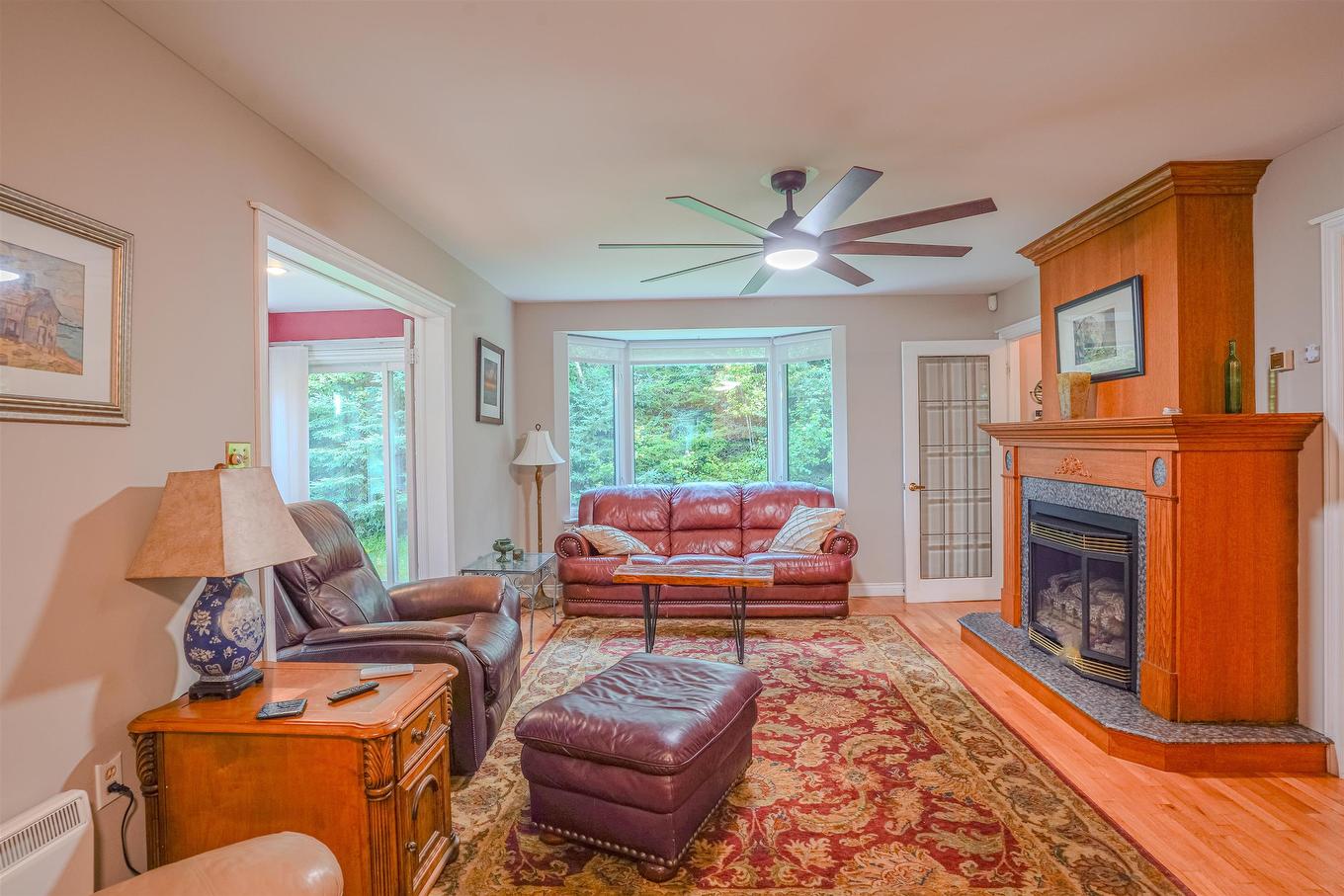 78 Lady Slipper Lane, Murray River, PE - Indoor Photo Showing Living Room With Fireplace