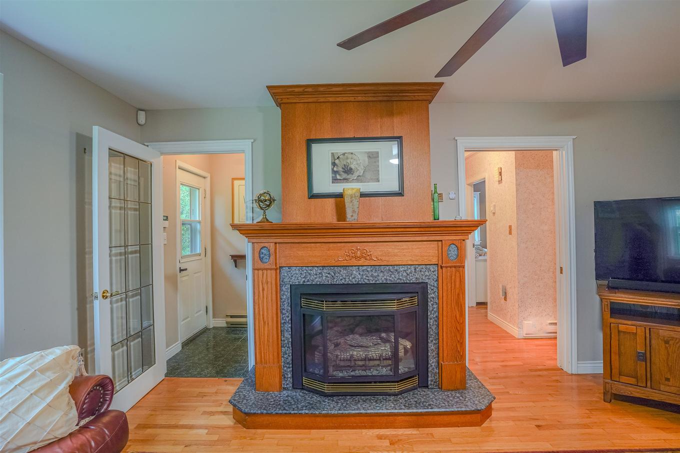 78 Lady Slipper Lane, Murray River, PE - Indoor Photo Showing Living Room With Fireplace