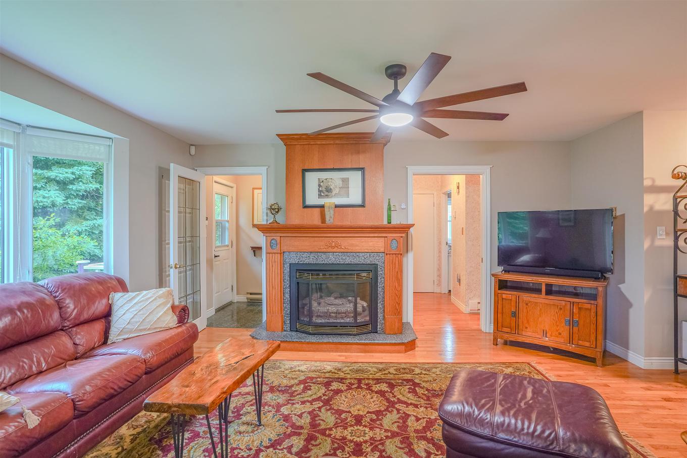 78 Lady Slipper Lane, Murray River, PE - Indoor Photo Showing Living Room With Fireplace