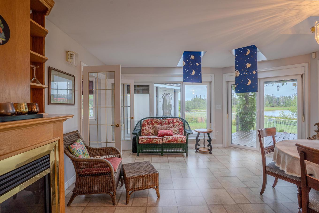 78 Lady Slipper Lane, Murray River, PE - Indoor Photo Showing Living Room With Fireplace