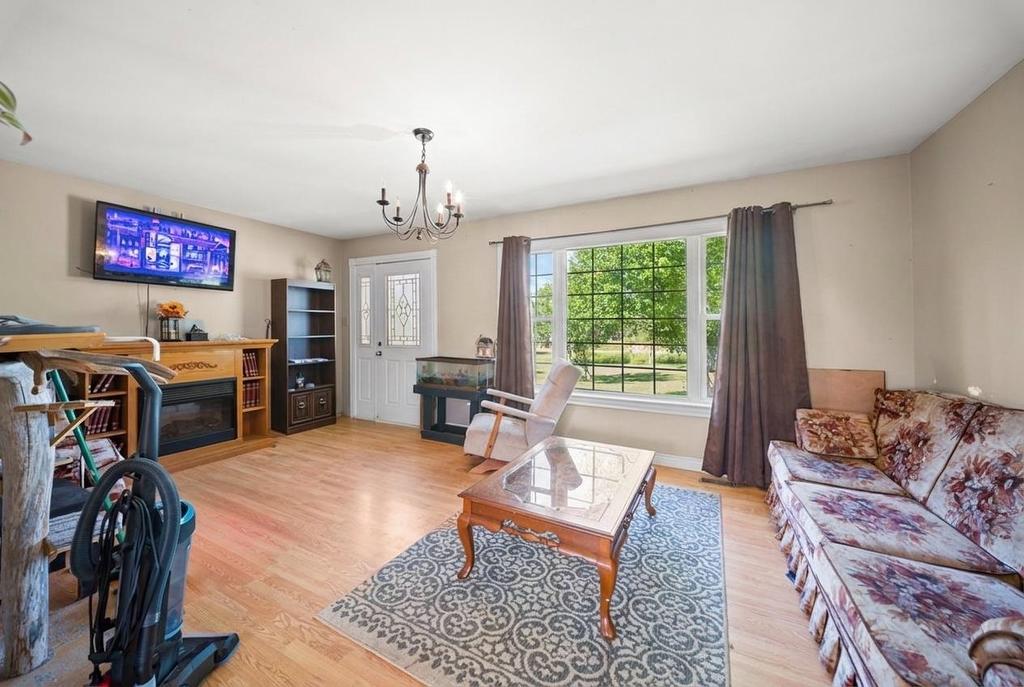 370 Diversion Road, Ellerslie-Bideford, PE - Indoor Photo Showing Living Room With Fireplace