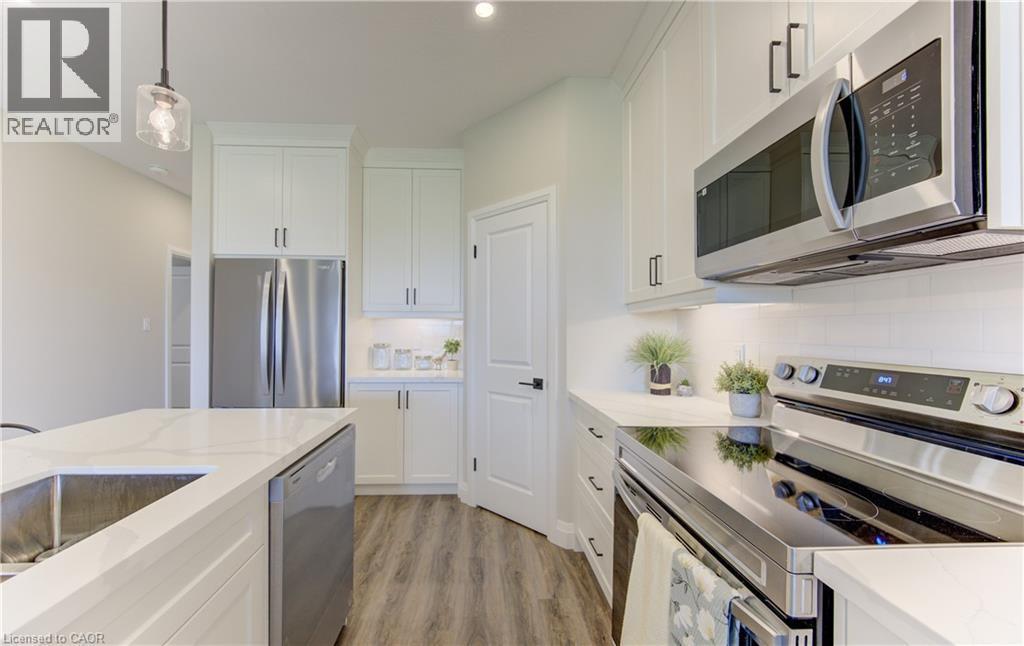 98 Bedell Drive, Drayton, ON - Indoor Photo Showing Kitchen With Upgraded Kitchen