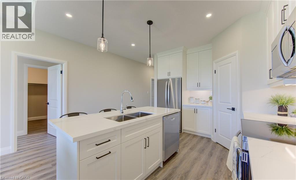 98 Bedell Drive, Drayton, ON - Indoor Photo Showing Kitchen With Double Sink With Upgraded Kitchen