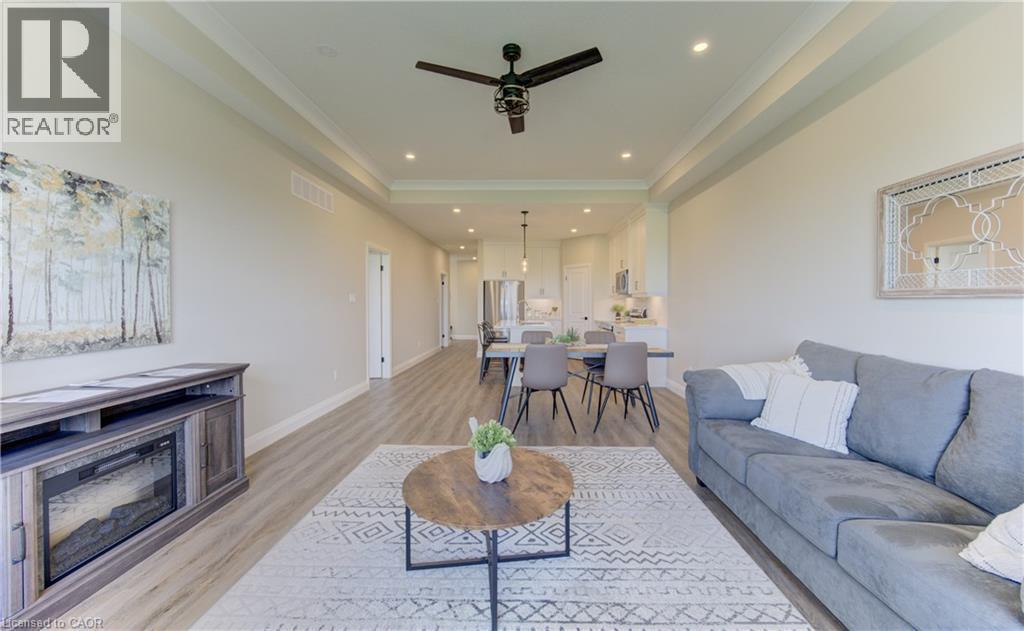 98 Bedell Drive, Drayton, ON - Indoor Photo Showing Living Room With Fireplace