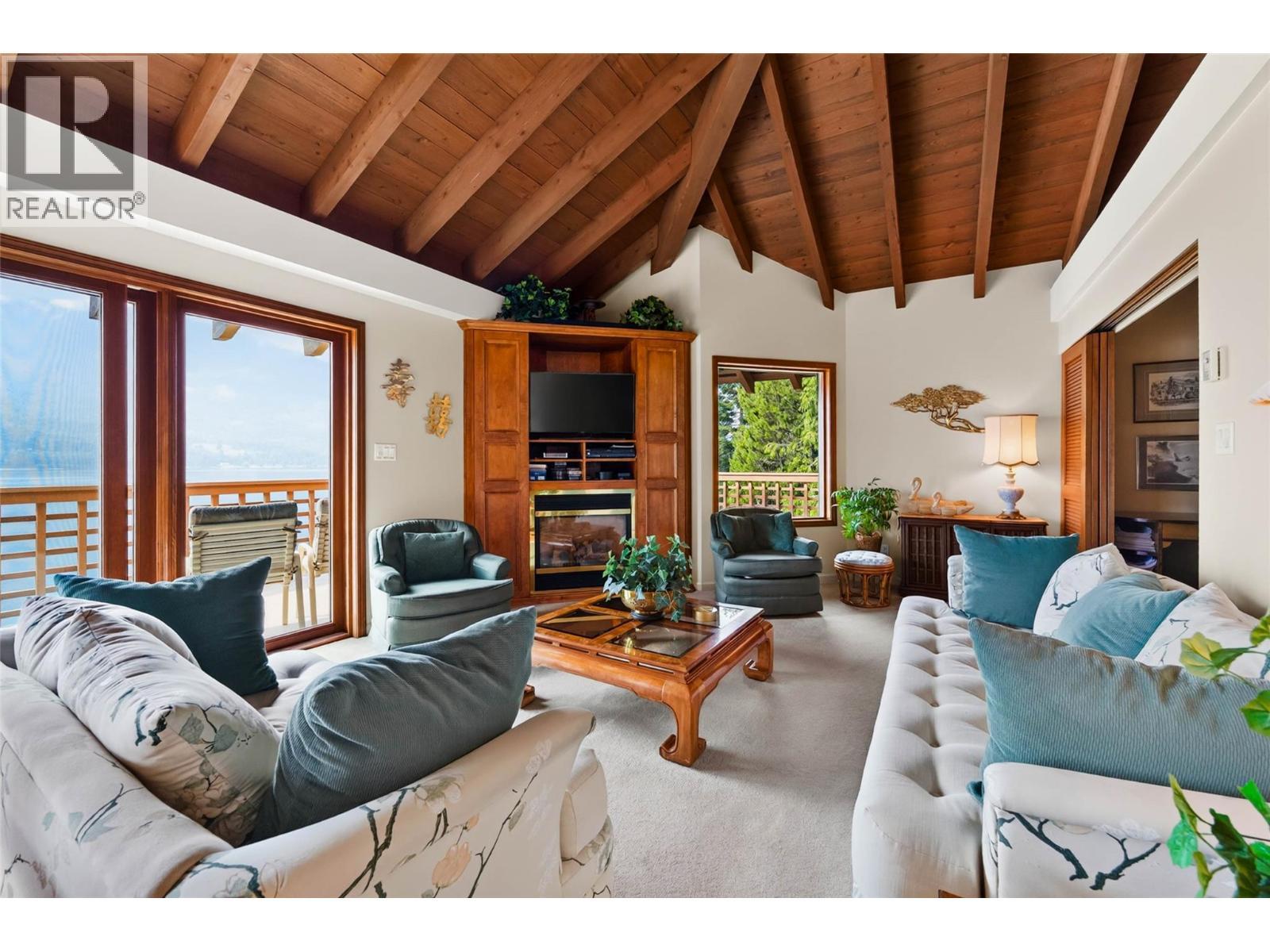 6714 3A Highway, Nelson, BC - Indoor Photo Showing Living Room With Fireplace