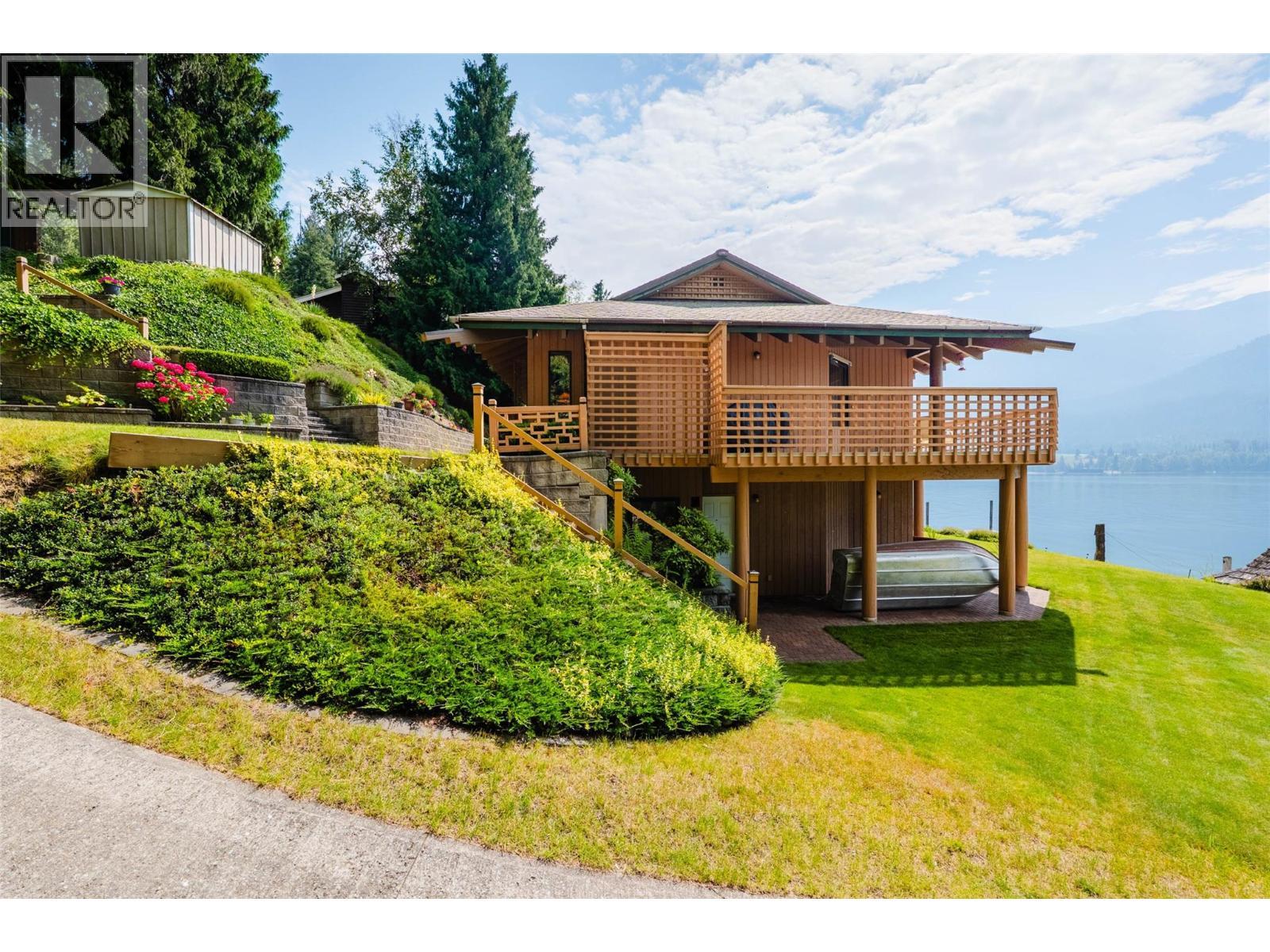 6714 3A Highway, Nelson, BC - Outdoor With Body Of Water With Deck Patio Veranda