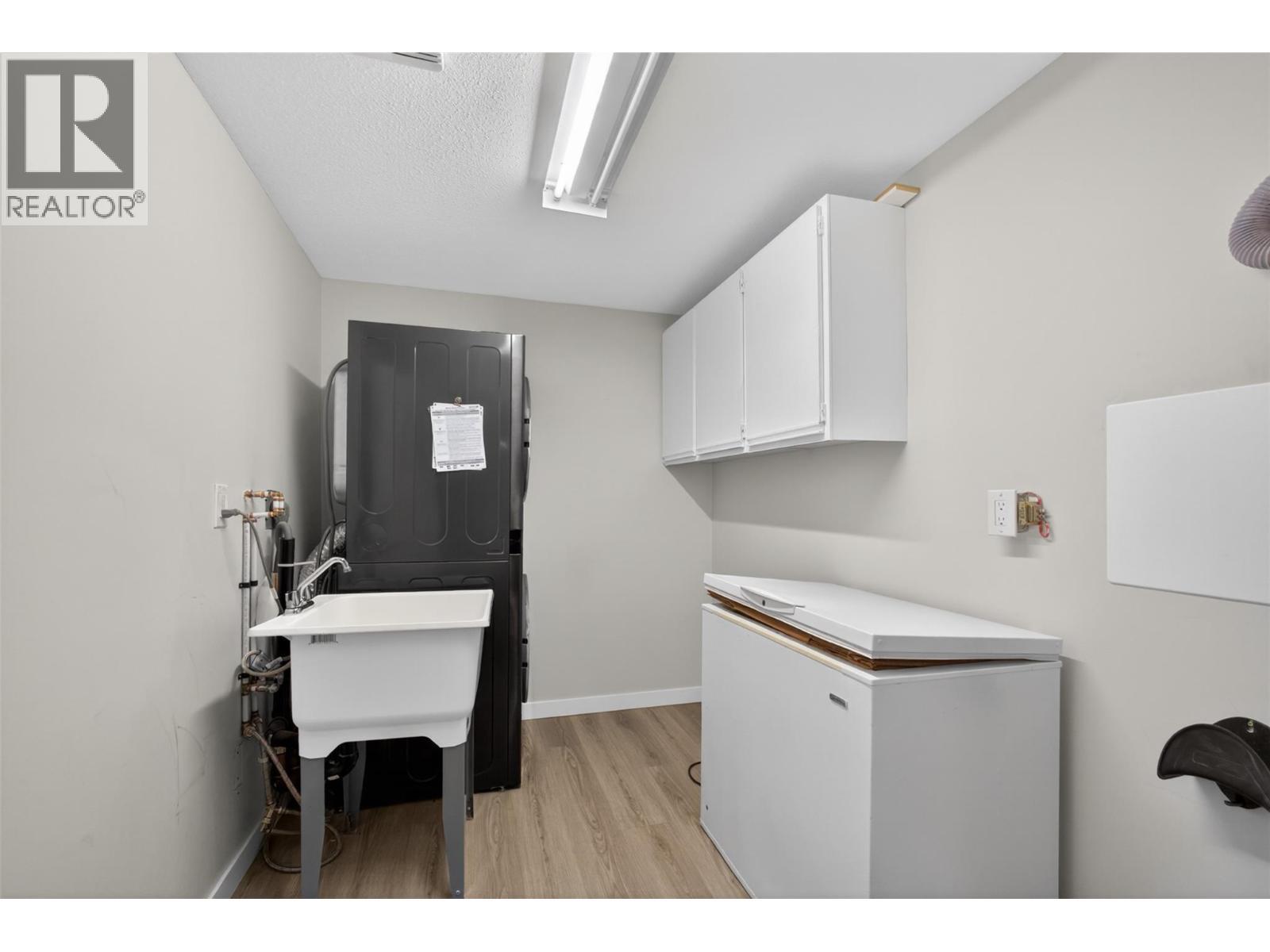 Large in unit laundry storage room. - 1610 Gordon Drive Unit# 101 Lot# 1, Kelowna, BC - Indoor