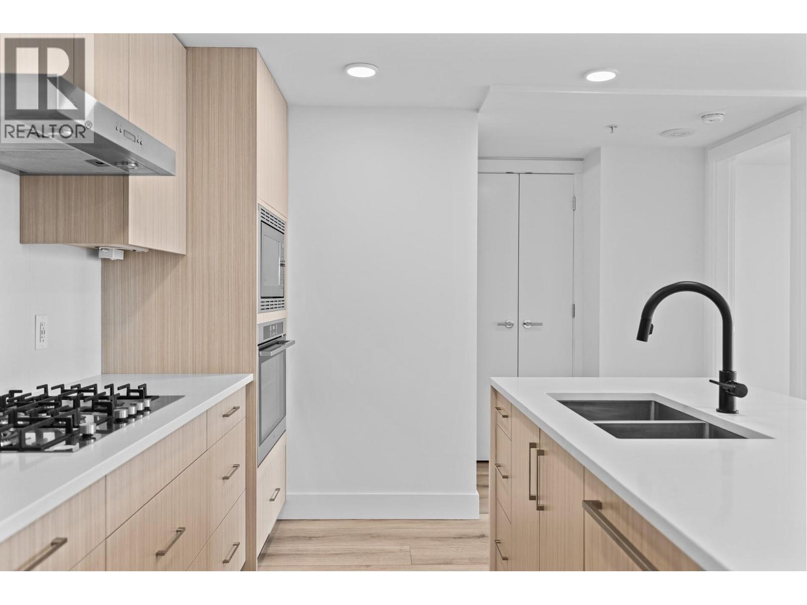 1588 Ellis Street Unit# 1101, Kelowna, BC - Indoor Photo Showing Kitchen With Double Sink