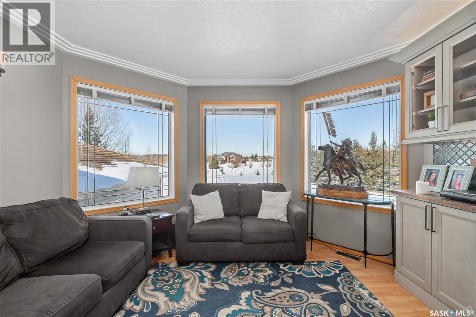 808 Lakeridge Drive, Buckland Rm No. 491, SK - Indoor Photo Showing Living Room