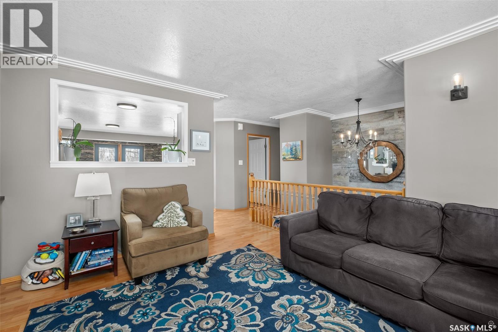 808 Lakeridge Drive, Buckland Rm No. 491, SK - Indoor Photo Showing Living Room