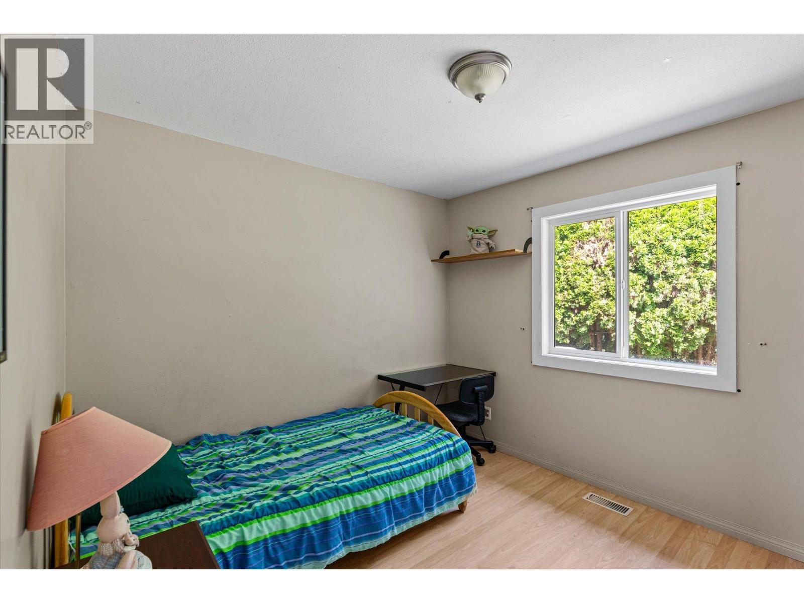 1881 Portland Place, Kelowna, BC - Indoor Photo Showing Bedroom