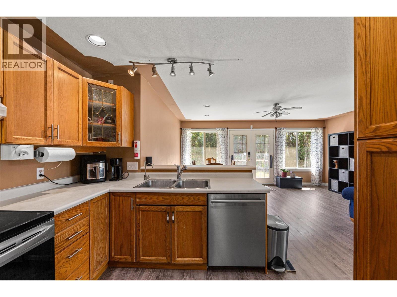 1881 Portland Place, Kelowna, BC - Indoor Photo Showing Kitchen With Double Sink