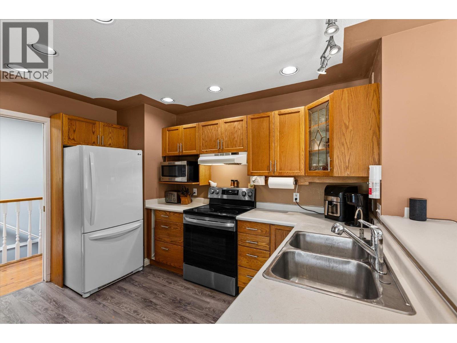1881 Portland Place, Kelowna, BC - Indoor Photo Showing Kitchen With Double Sink