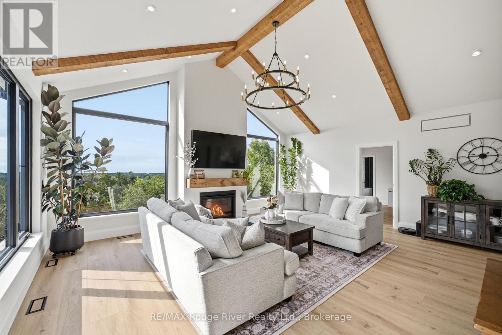 3041 Stu Black Road, Hamilton Township, ON - Indoor With Fireplace