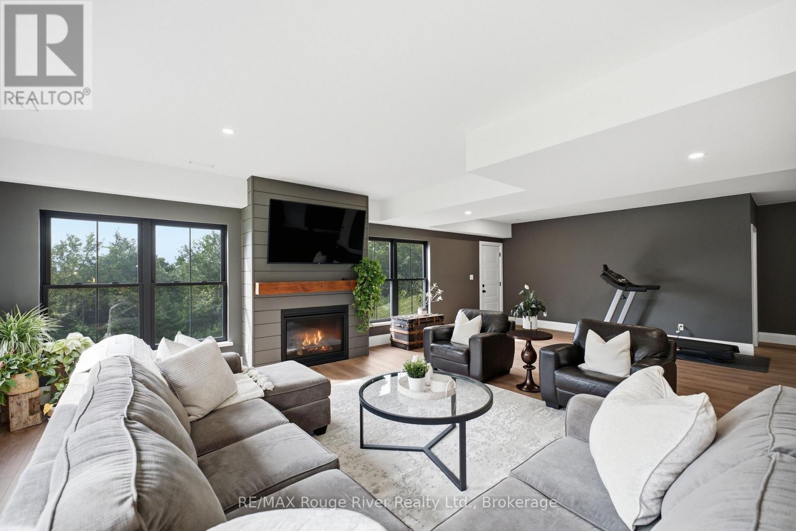 3041 Stu Black Road, Hamilton Township, ON - Indoor Photo Showing Living Room With Fireplace