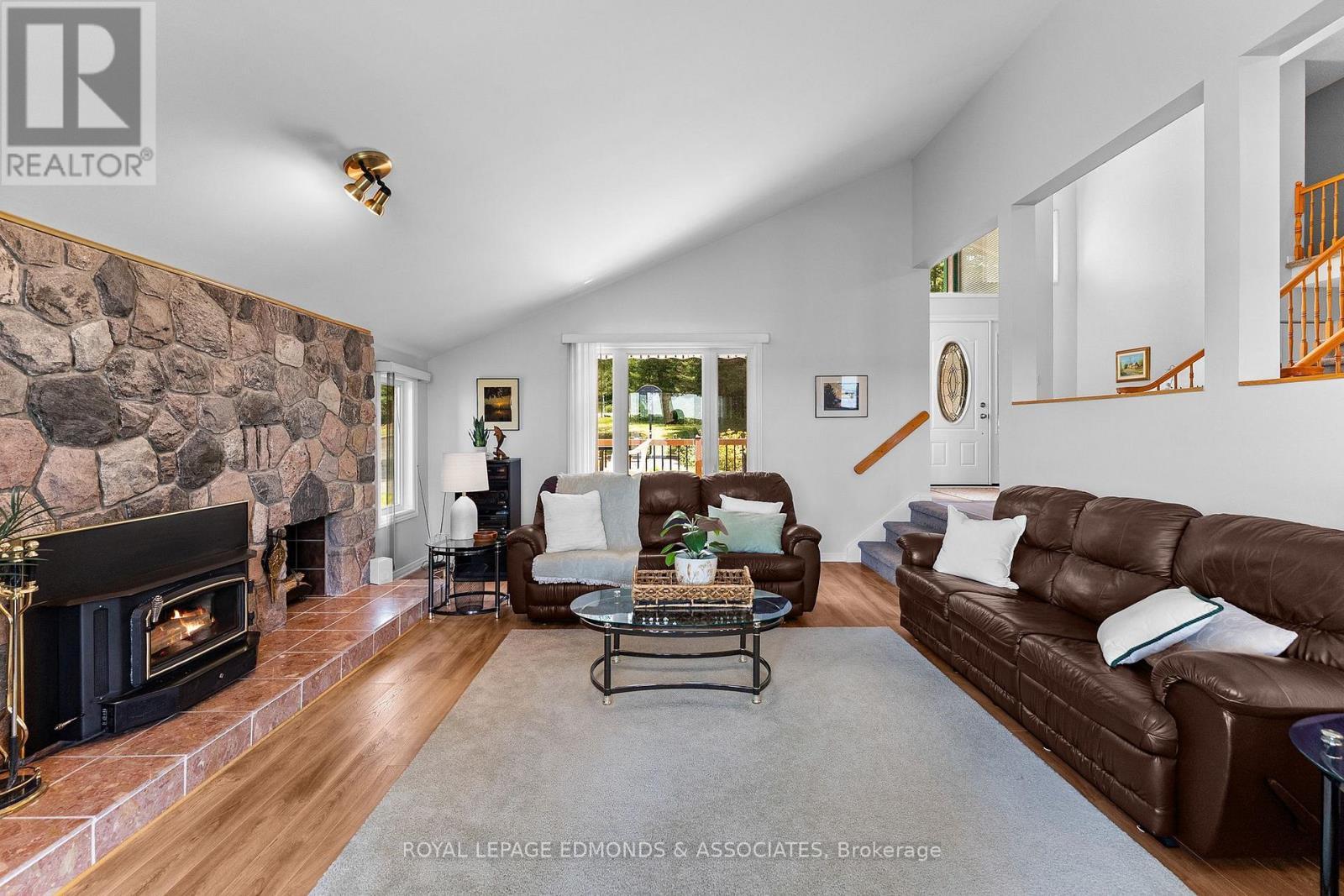 382 Greenway Drive, Whitewater Region, ON - Indoor Photo Showing Living Room With Fireplace