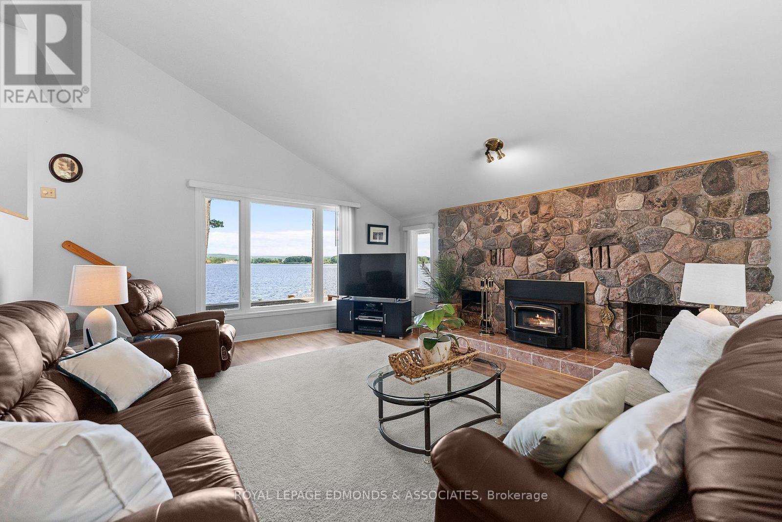 382 Greenway Drive, Whitewater Region, ON - Indoor Photo Showing Living Room With Fireplace