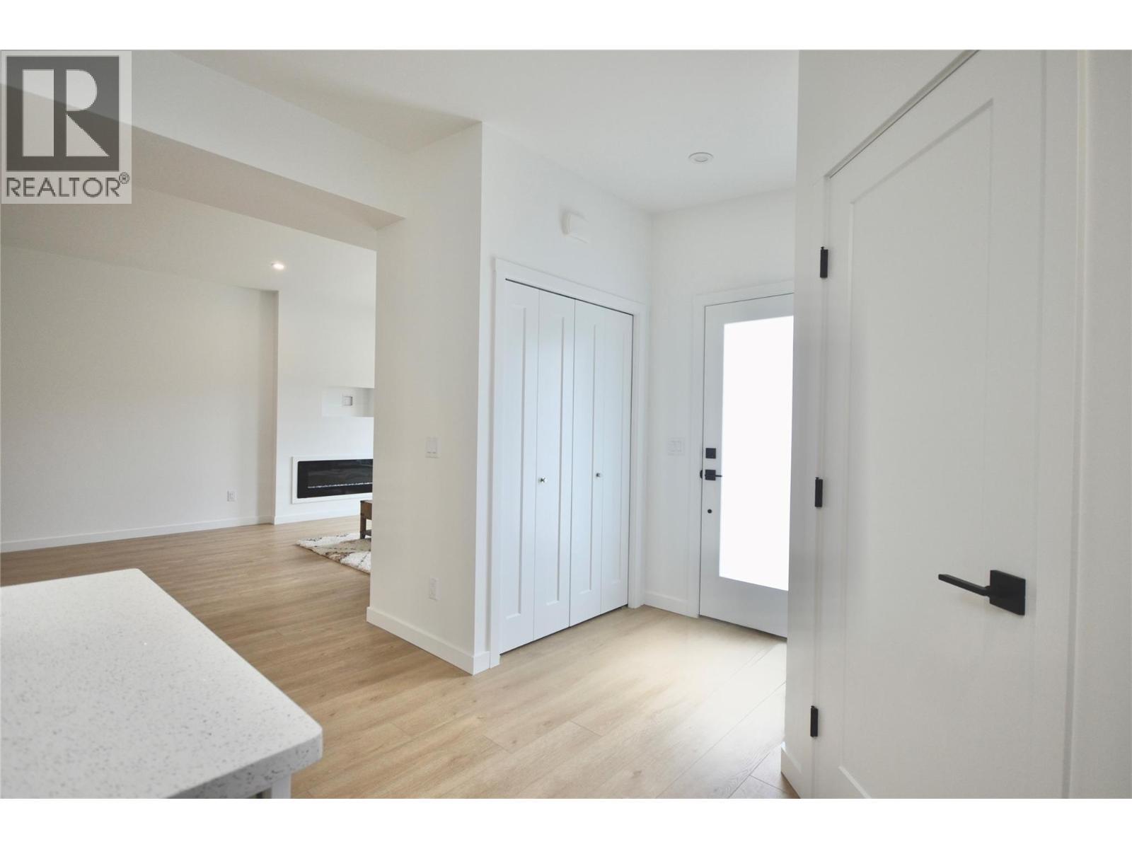 Front entrance & hall closet - 8900 Jim Bailey Road Unit# 126, Kelowna, BC