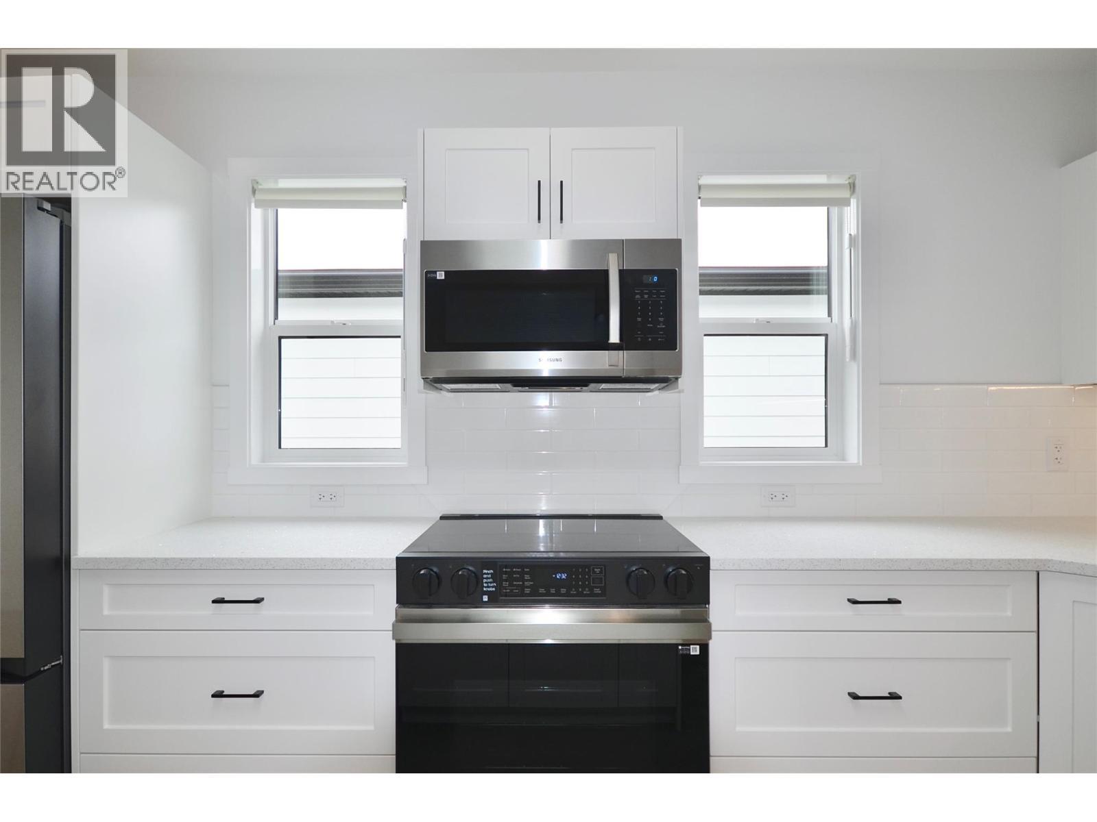 Expanded and upgraded kitchen with skylight - 8900 Jim Bailey Road Unit# 126, Kelowna, BC
