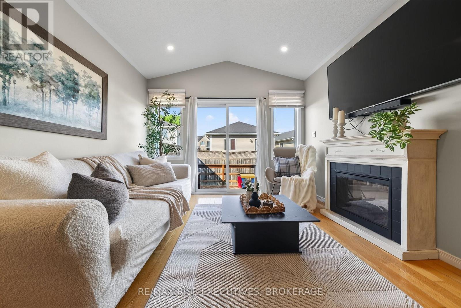 2030 Swanfield Street, Kingston (East Gardiners Rd), ON - Indoor Photo Showing Living Room With Fireplace