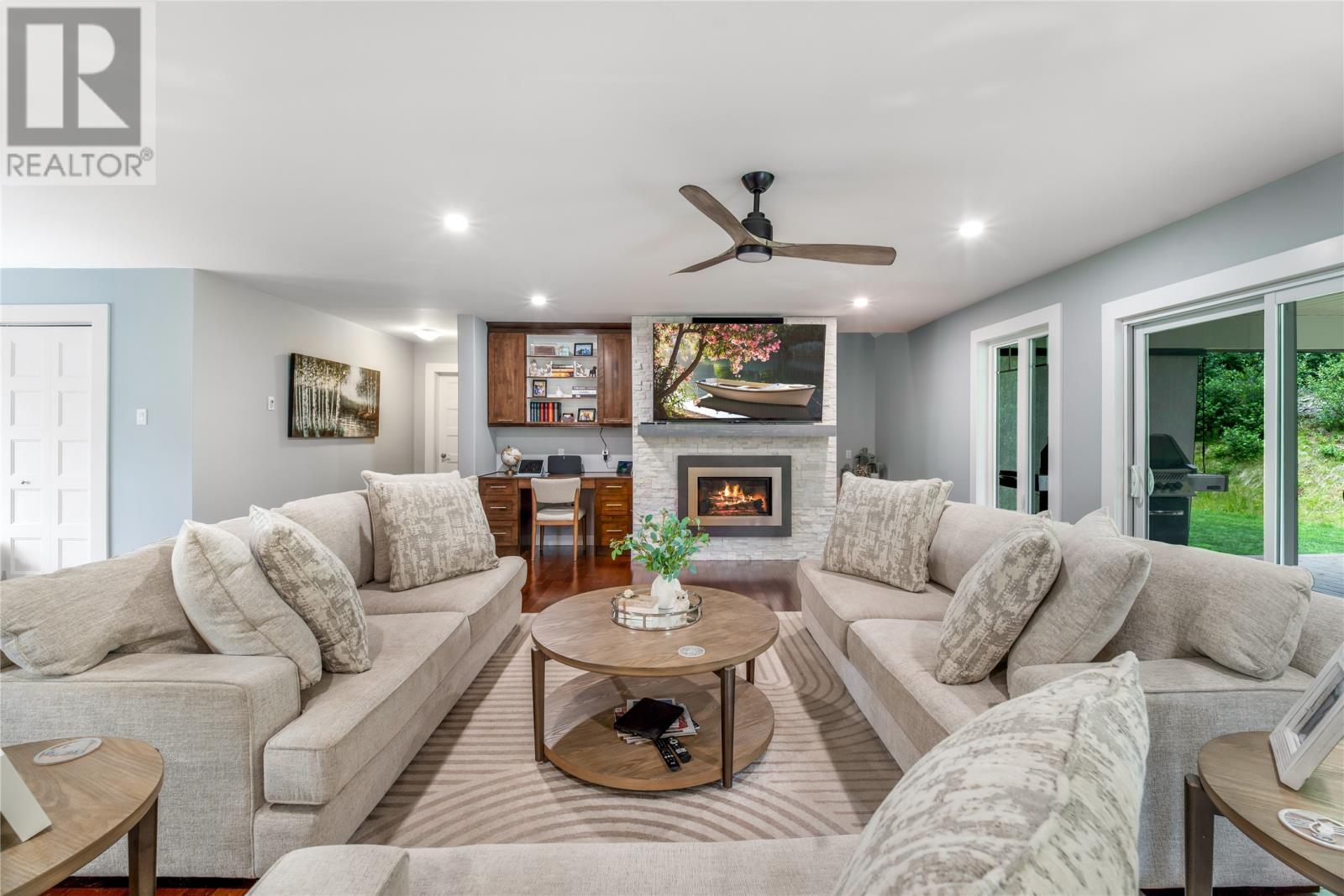226-228 Main Road, North River, NL - Indoor Photo Showing Living Room With Fireplace