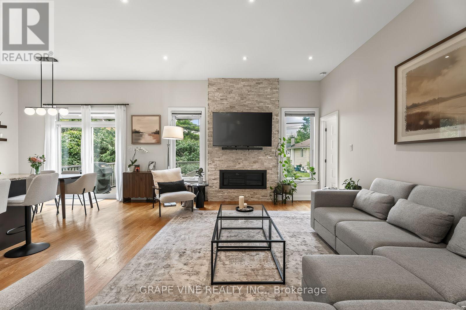 1592 Rosebella Avenue, Ottawa, ON - Indoor Photo Showing Living Room With Fireplace