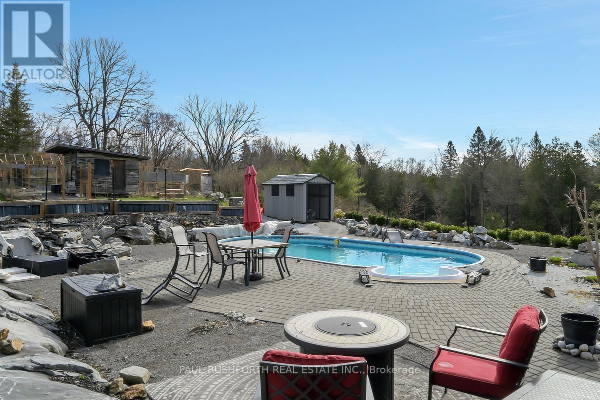 Backyard - 3968 Elphin Maberly Road, Frontenac (Frontenac North), ON - Outdoor With In Ground Pool With Deck Patio Veranda