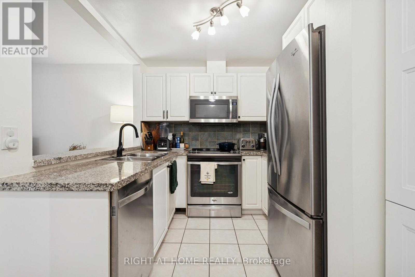 A30 - 108 Finch Avenue W, Toronto, ON - Indoor Photo Showing Kitchen With Stainless Steel Kitchen With Double Sink