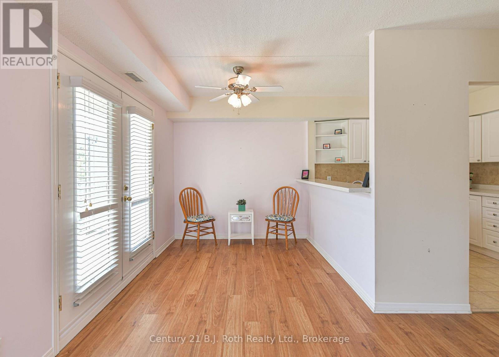 Dining room with walk out to balcony - Unit 201 - 115 Bond Street, Orillia, ON - Indoor Photo Showing Other Room
