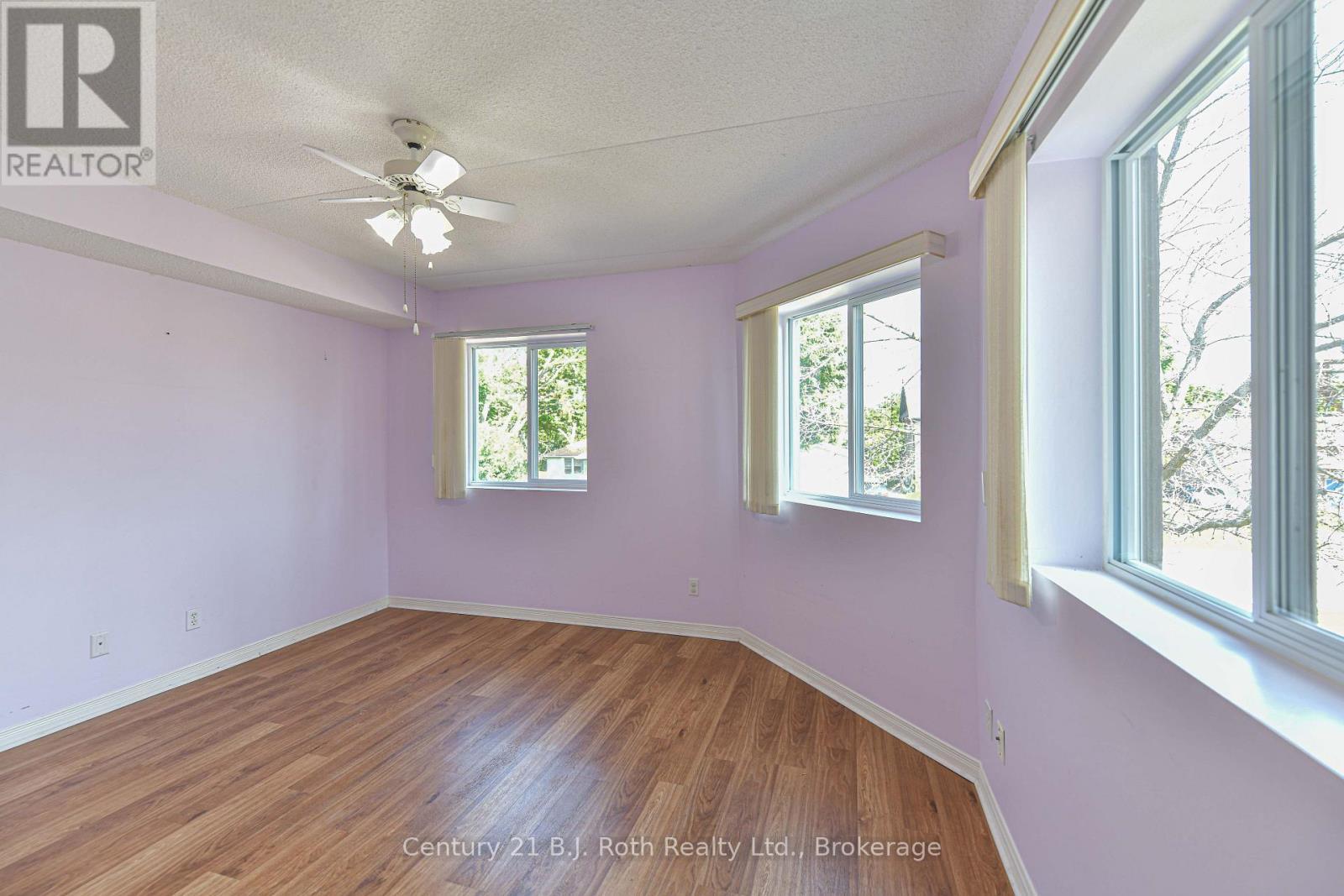 Primary bedroom - Unit 201 - 115 Bond Street, Orillia, ON - Indoor Photo Showing Other Room