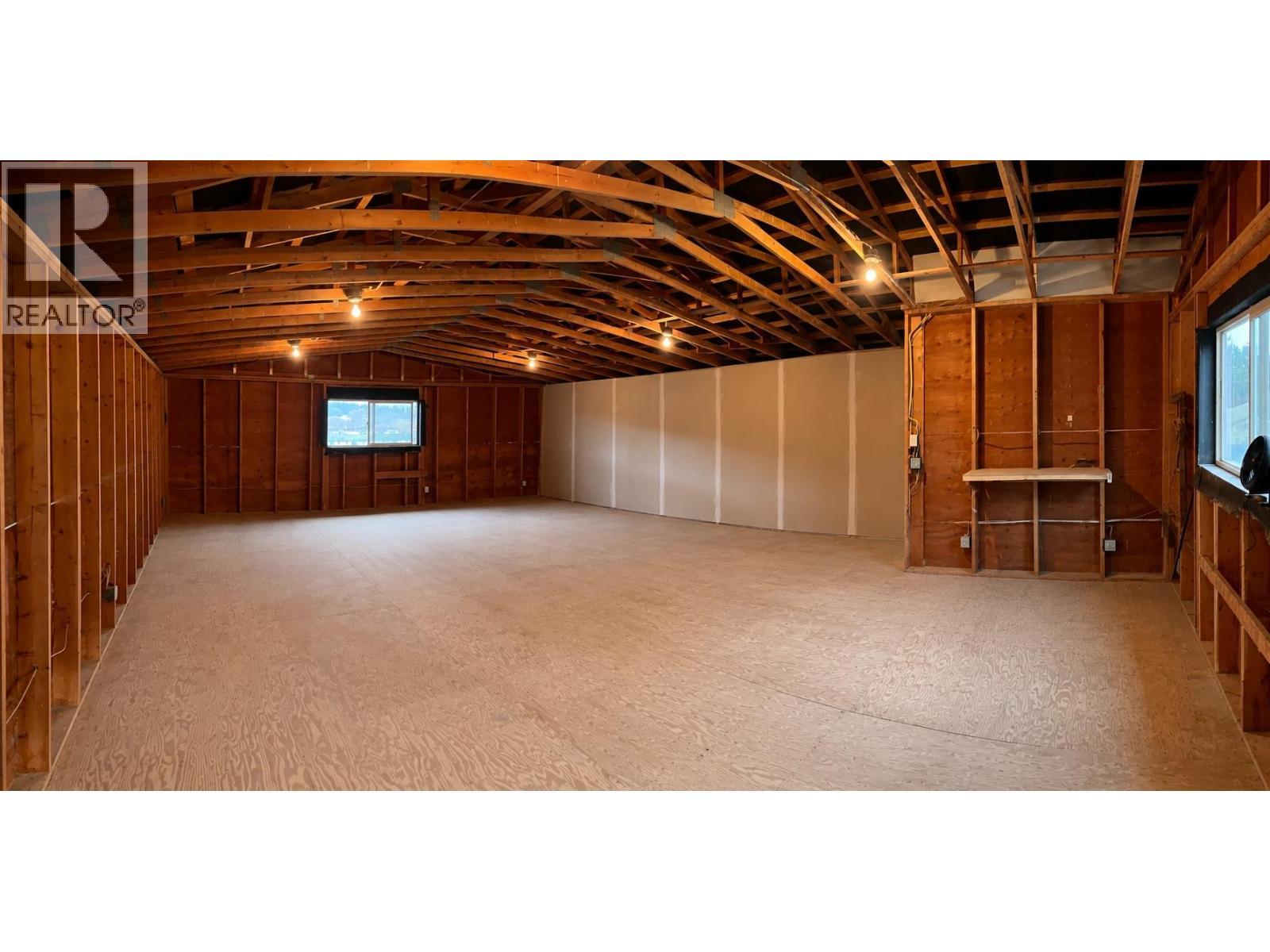 Inside upper floor of workshop. - 528 Snowsell Street N, Kelowna, BC