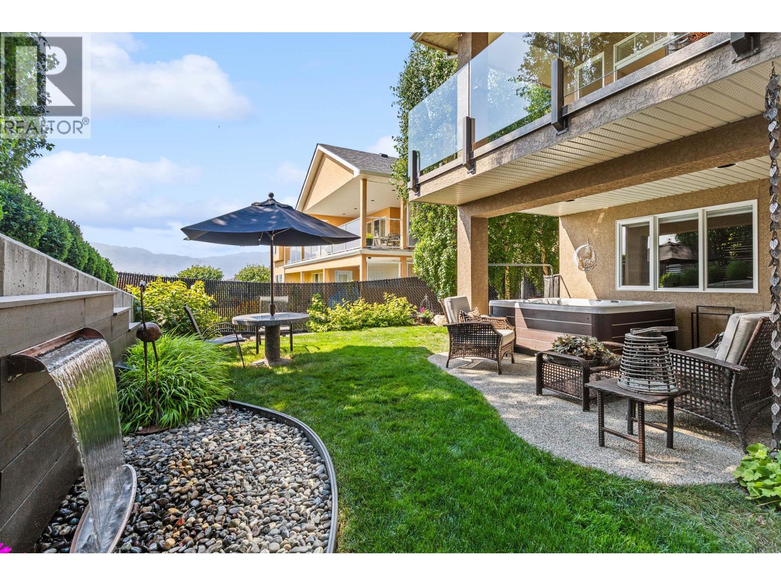 Back Yard Water Feature - 1635 Gregory Road, West Kelowna, BC - Outdoor With Deck Patio Veranda
