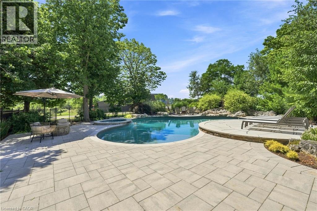 62 Thompson Road, Brantford, ON - Outdoor With In Ground Pool With Backyard