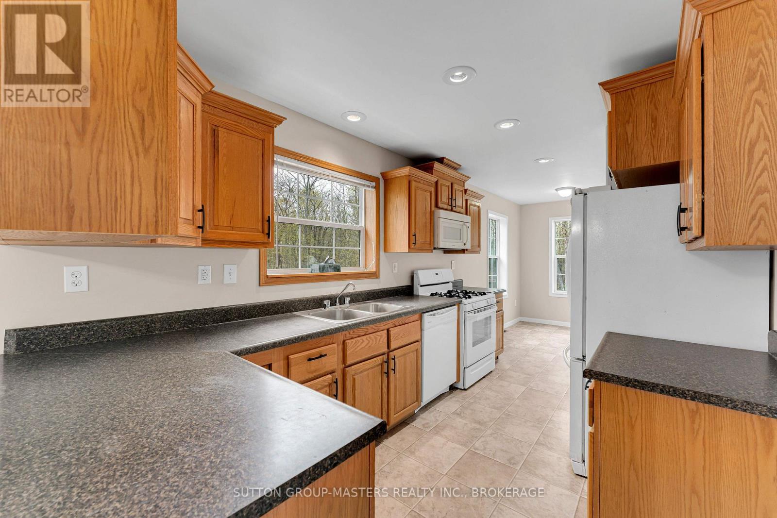 1140 St. Georges Lake Road, Frontenac (Frontenac Centre), ON - Indoor Photo Showing Kitchen With Double Sink