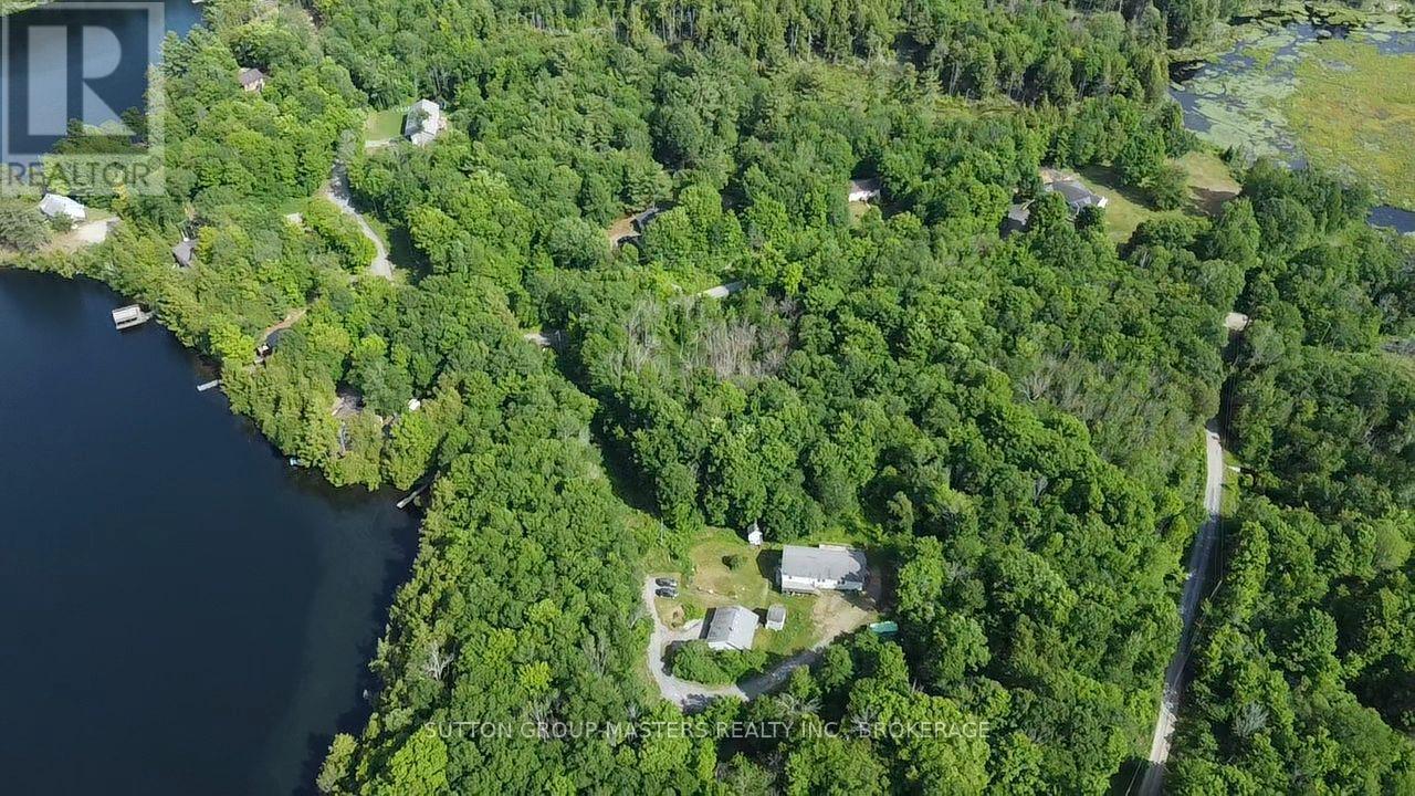 1140 St. Georges Lake Road, Frontenac (Frontenac Centre), ON - Outdoor With Body Of Water With View