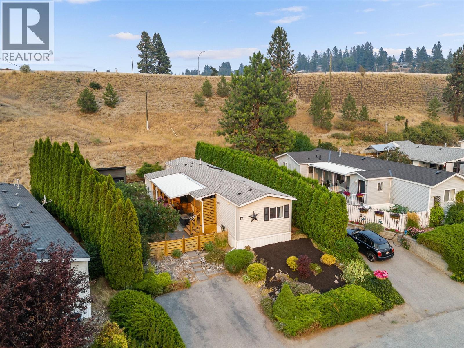 Your quiet retreat space, nestled against the hillside. - 610 Katherine Road Unit# 12, Kelowna, BC