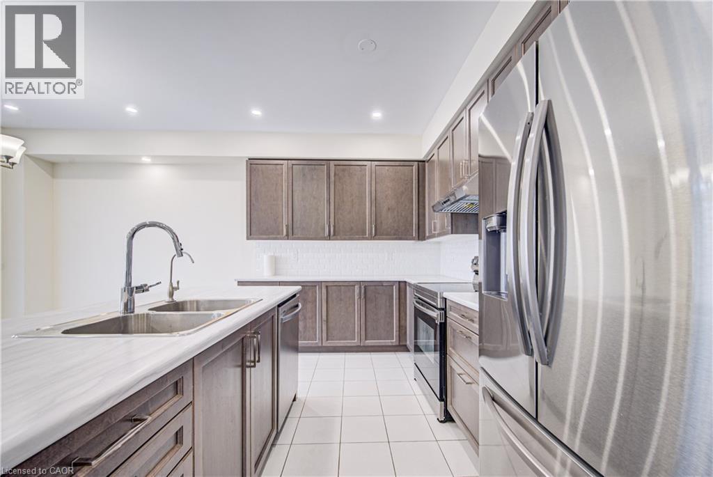 407 Dolman Street, Breslau, ON - Indoor Photo Showing Kitchen With Double Sink With Upgraded Kitchen