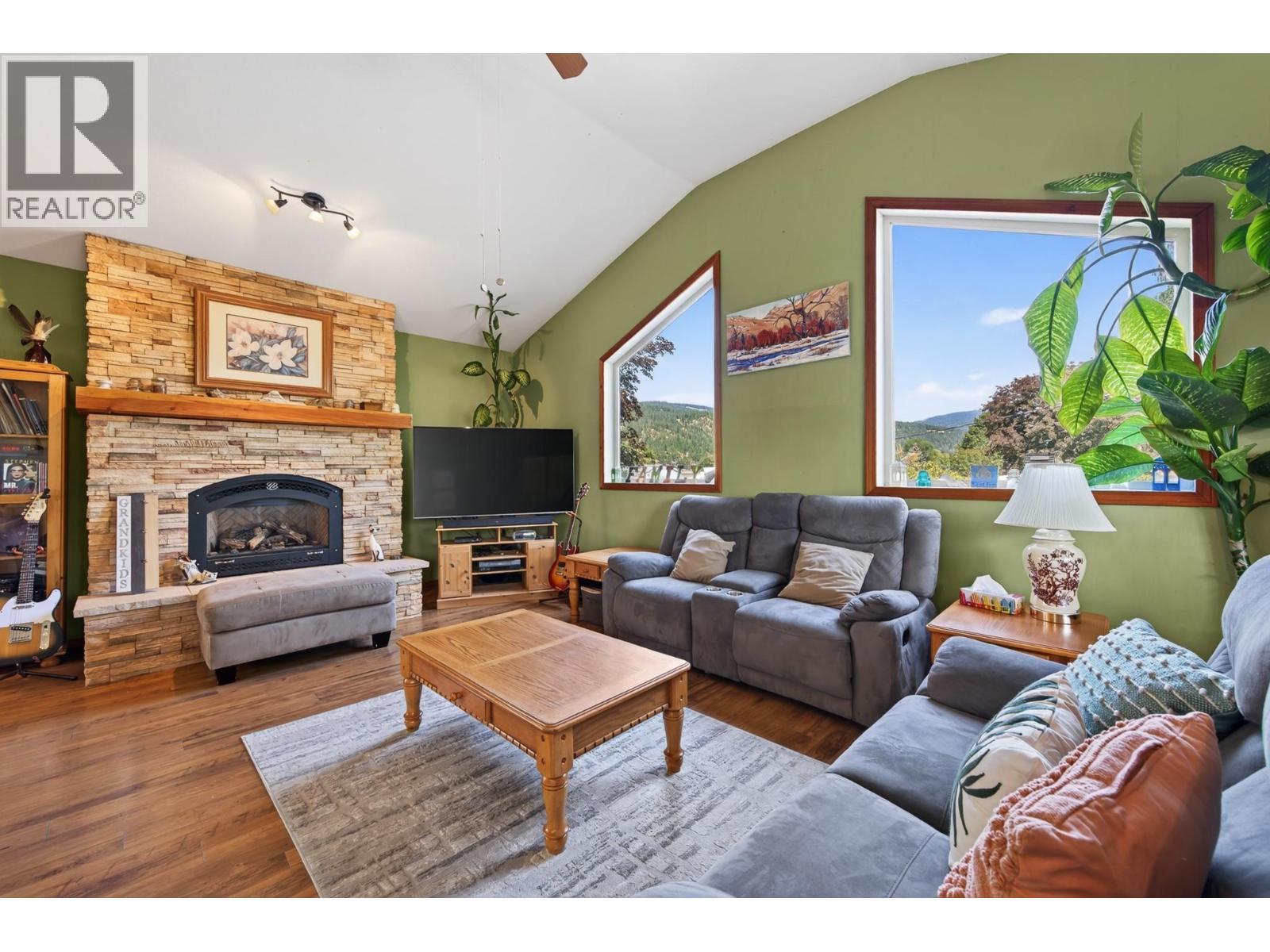 6750 Heffley Road, Kamloops, BC - Indoor Photo Showing Living Room With Fireplace