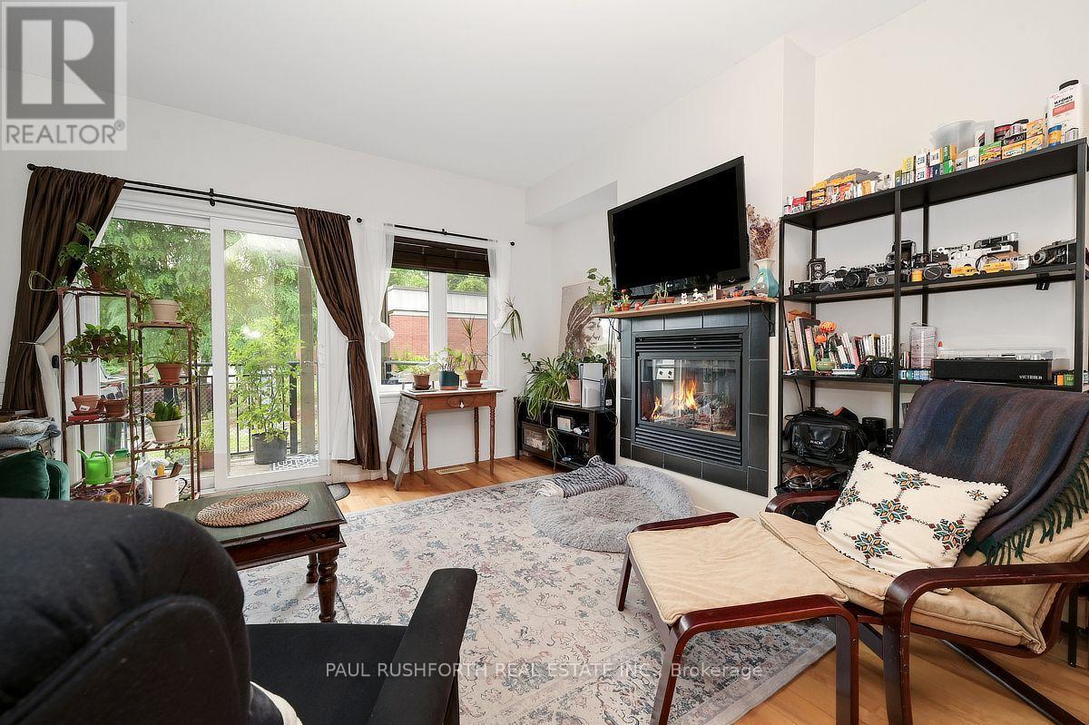 Living Room - 3 - 795 Montreal Road, Ottawa, ON - Indoor Photo Showing Living Room With Fireplace