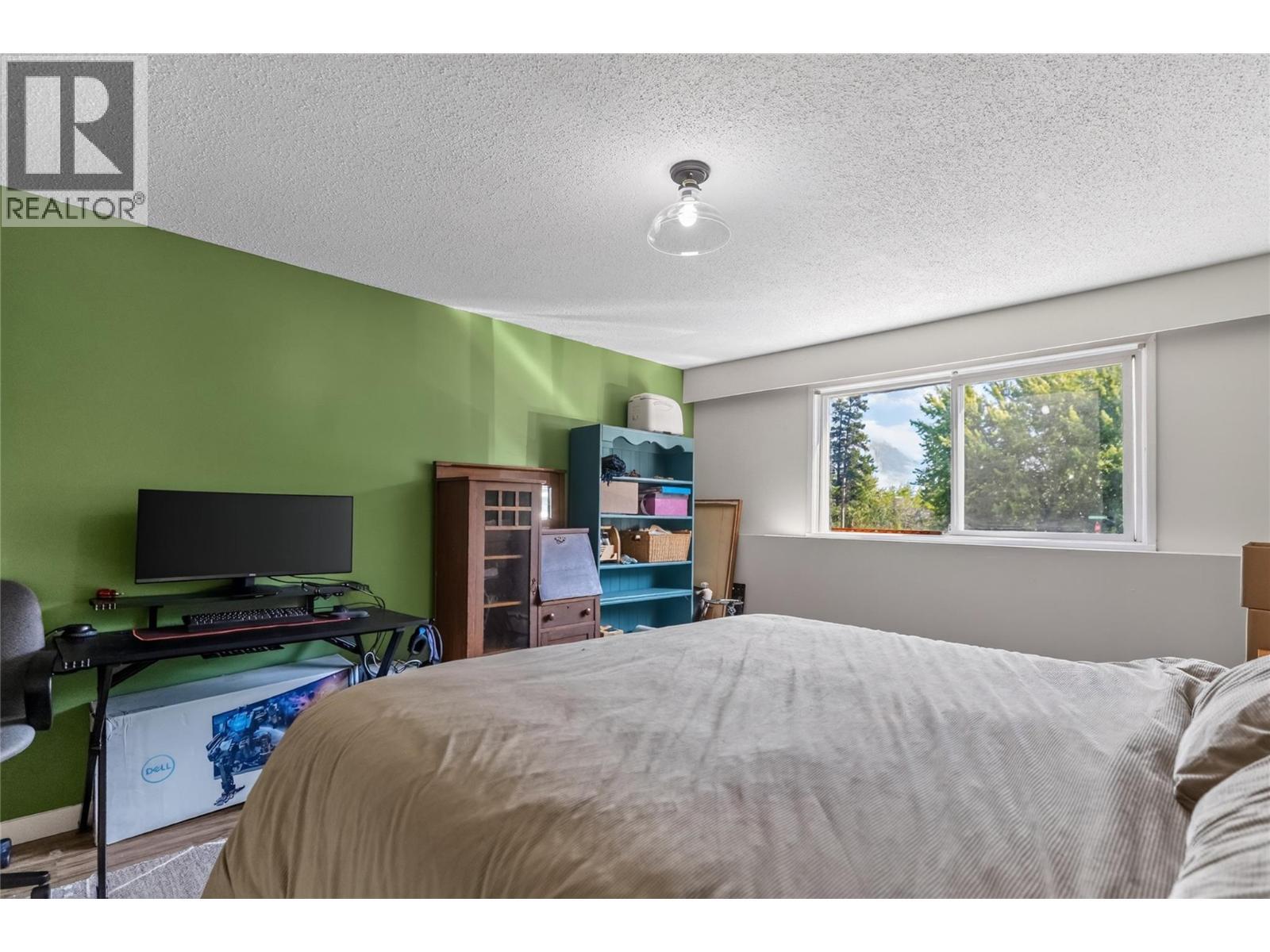 40 Ridgemont Avenue Unit# 101, Fernie, BC - Indoor Photo Showing Bedroom