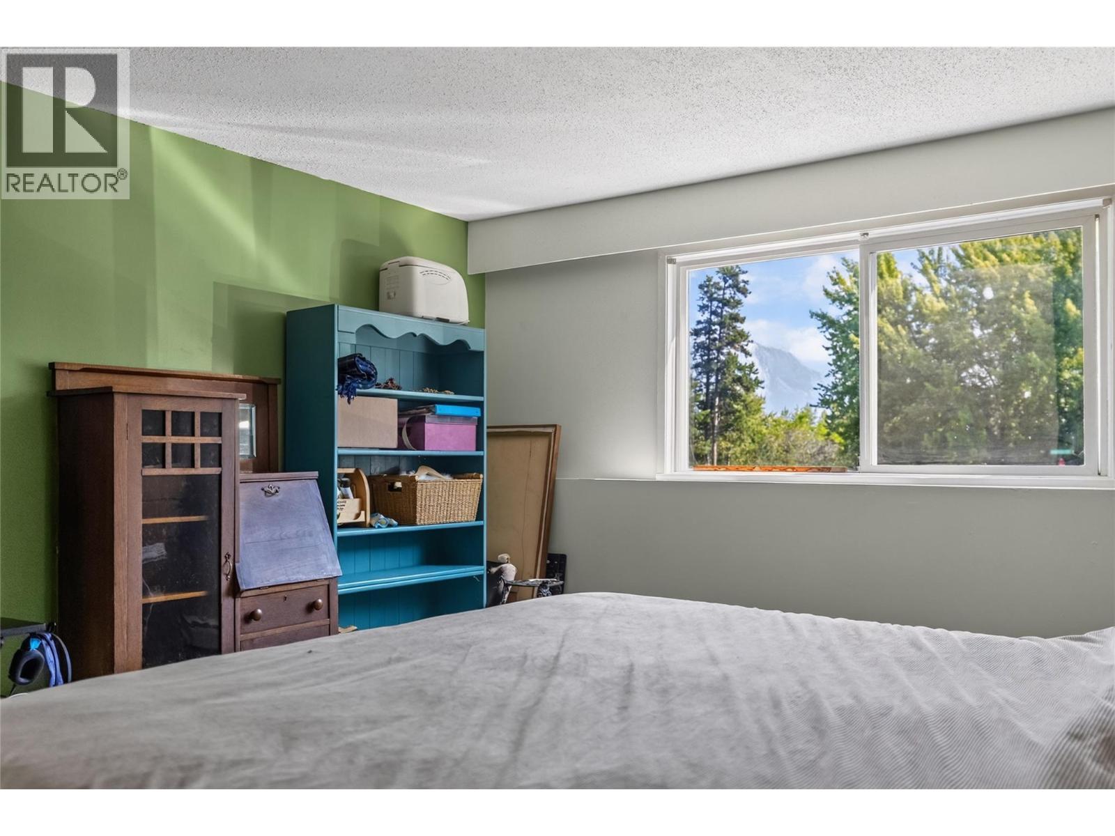 40 Ridgemont Avenue Unit# 101, Fernie, BC - Indoor Photo Showing Bedroom