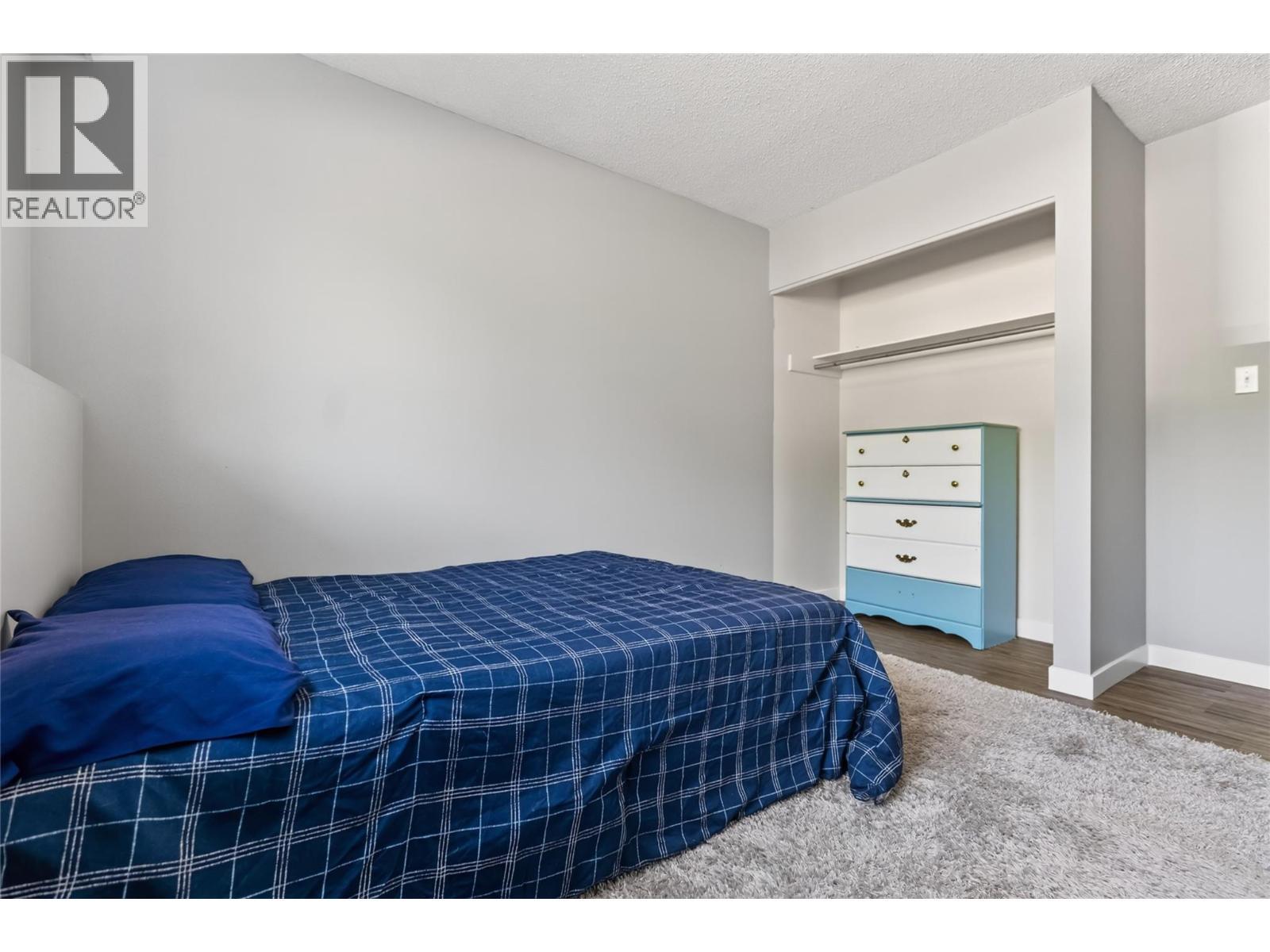 40 Ridgemont Avenue Unit# 101, Fernie, BC - Indoor Photo Showing Bedroom