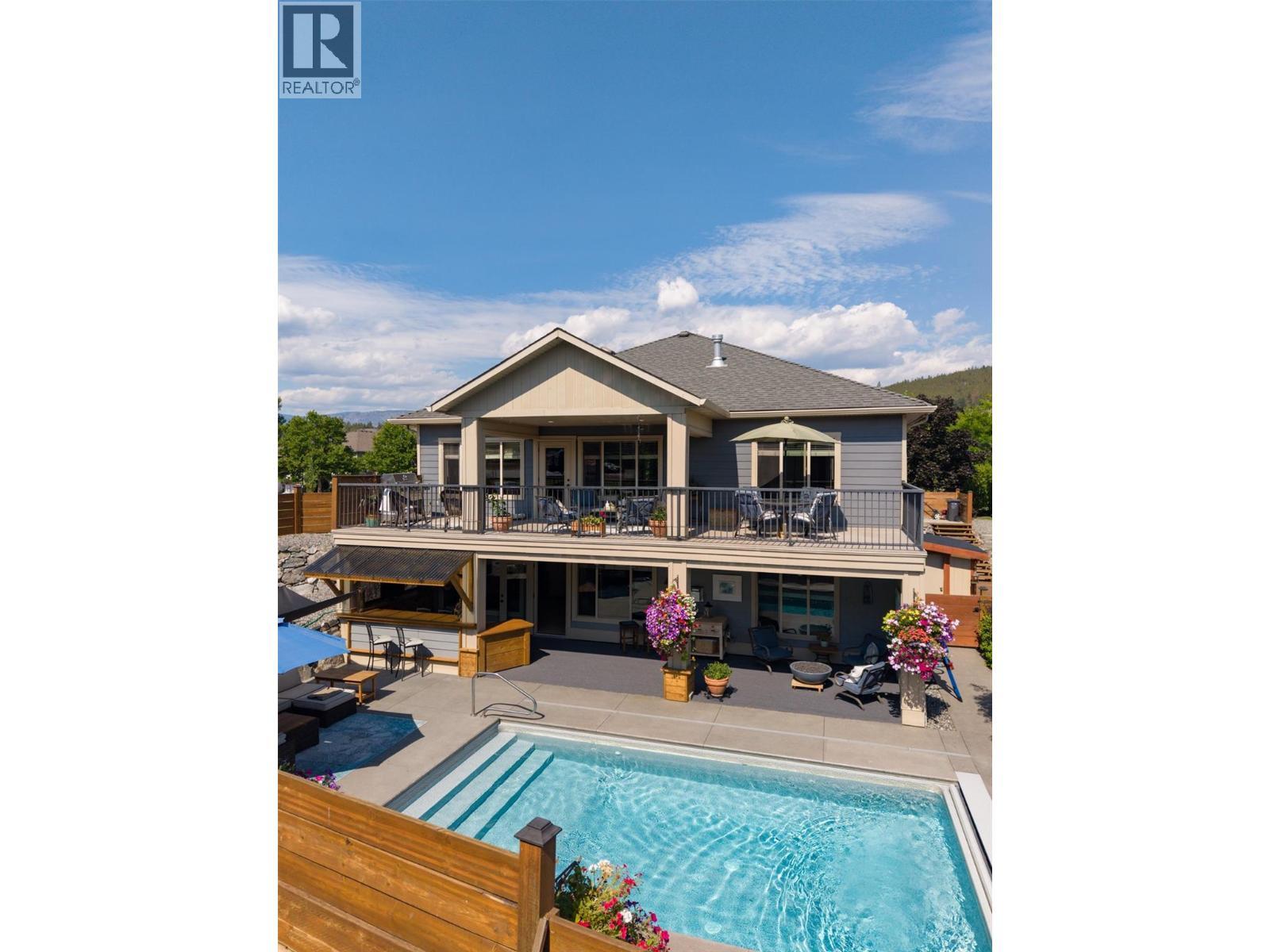 12931 East Ridge Drive, Lake Country, BC - Outdoor With In Ground Pool With Deck Patio Veranda