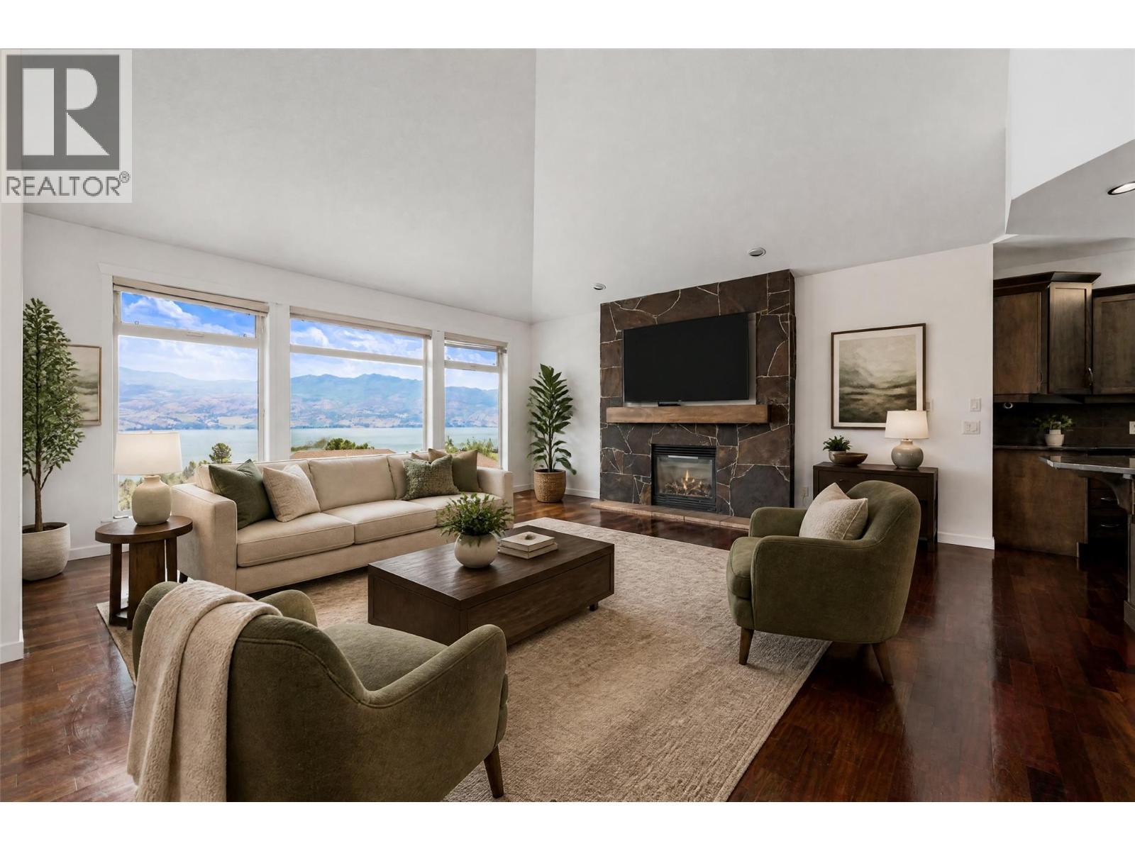 Upper Living - virtually staged - 1581 Gregory Road, West Kelowna, BC - Indoor Photo Showing Living Room With Fireplace