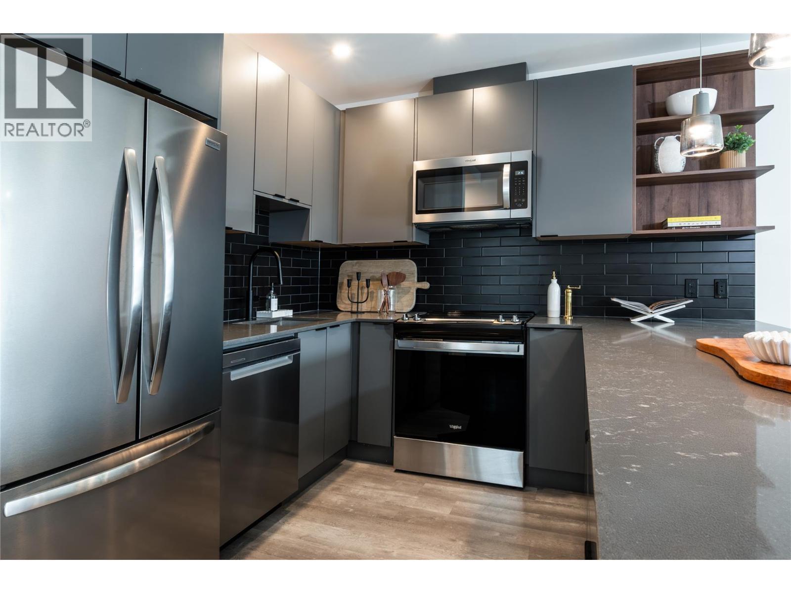 1701 Coursier Avenue Unit# 2213, Revelstoke, BC - Indoor Photo Showing Kitchen With Stainless Steel Kitchen