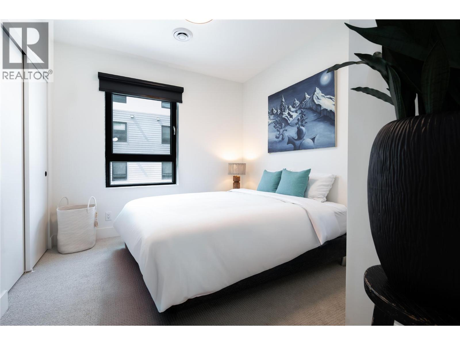 1701 Coursier Avenue Unit# 2213, Revelstoke, BC - Indoor Photo Showing Bedroom