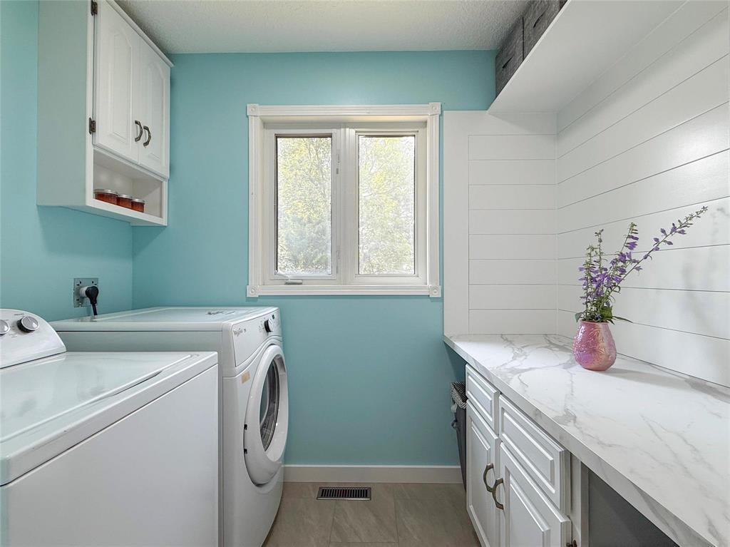 106100 43 (Treesbank) Road N, Brandon, MB - Indoor Photo Showing Laundry Room
